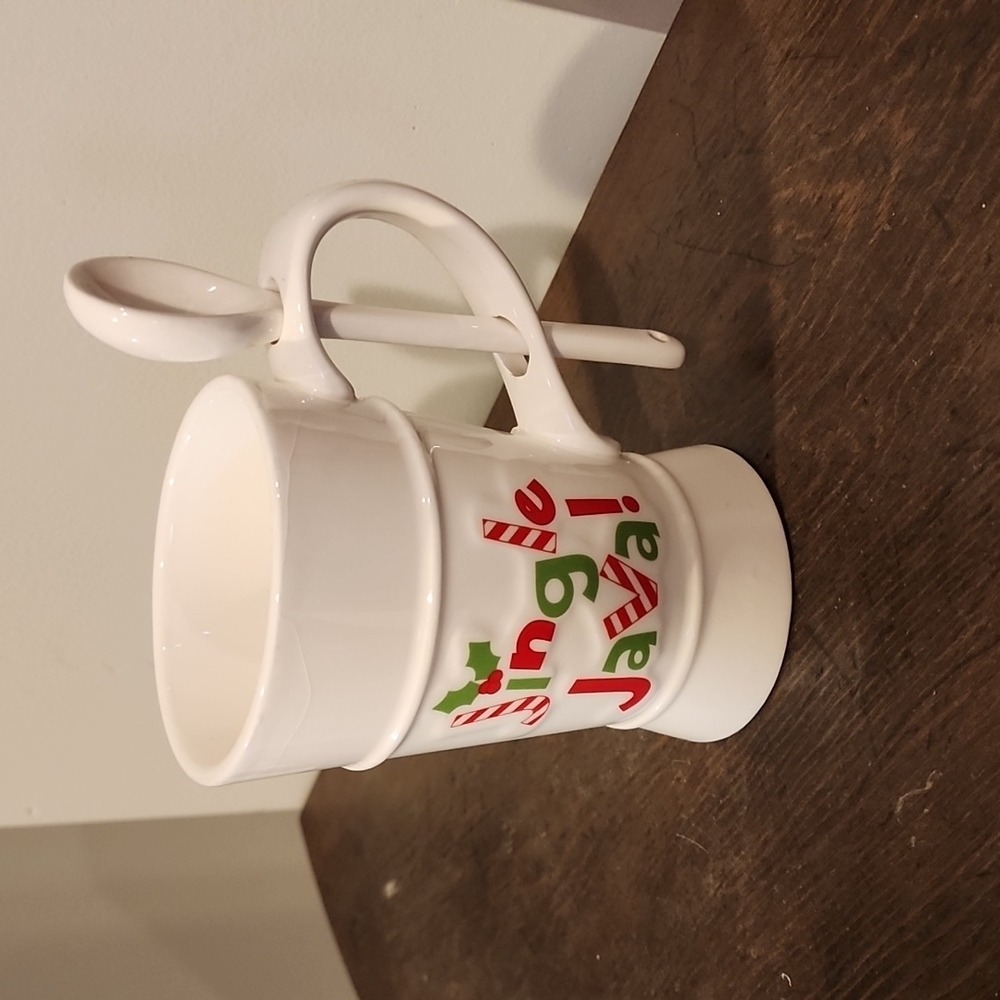 Earthenware. Ceramic coffee mug with spoon.